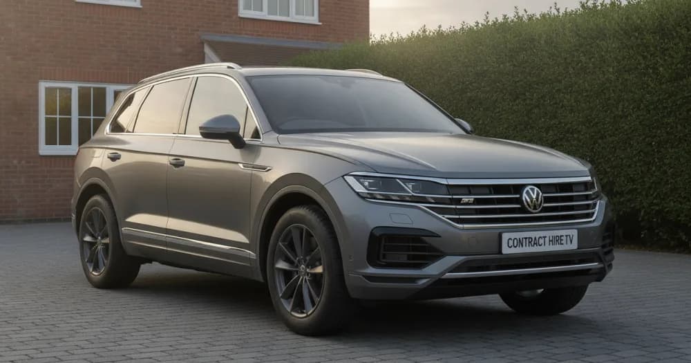 A white Touareg on a brick-fronted driveway, showing versions available on a volkswagen touareg lease. A white Touareg on a brick-fronted driveway, showing versions available on a volkswagen touareg lease.